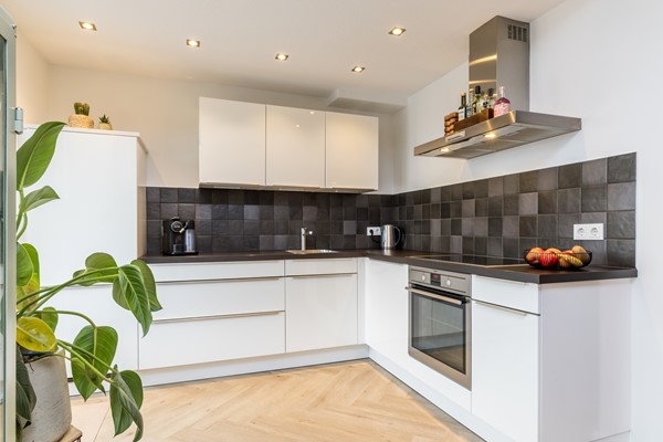 Foto - Te koop: Instapklare gemoderniseerde geschakelde 2 onder 1 kap woning in Simpelveld